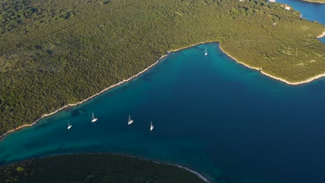 Aerial-View-Of-Sailboats-Floating-On-Adriatic-Sea-Near-Dugi-Otok-Island-In-Croatia