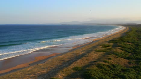 Aerial-View-Of-Wollongong-Beach-At-Sunset-In-Australia---drone-shot