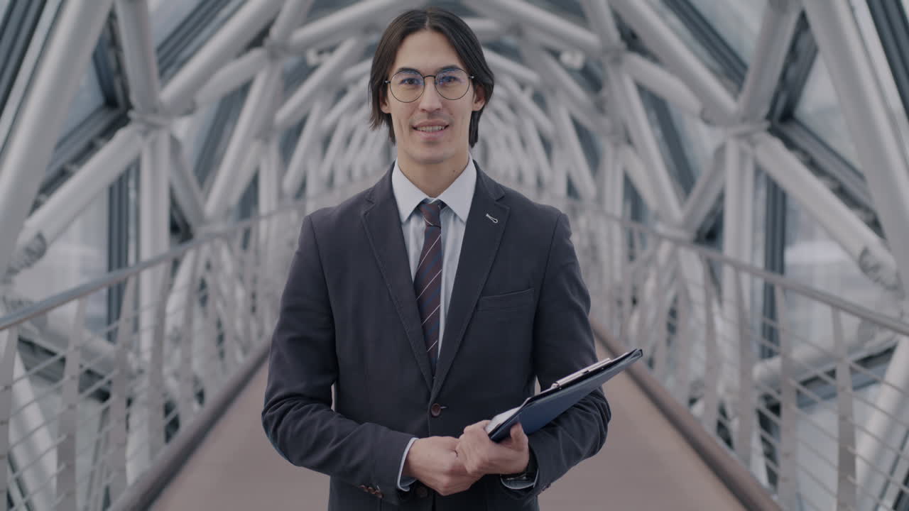 Businessman Walking on a Modern Bridge
