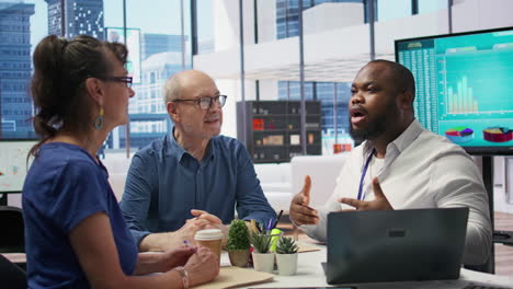 senior couple consulting with a professional financial advisor in a modern office