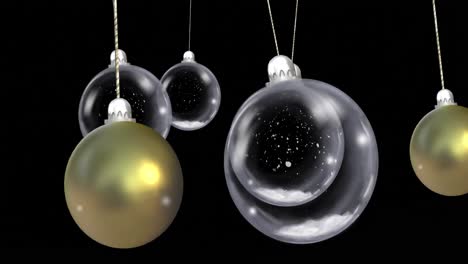 animation of christmas baubles dangling with snow falling on black background