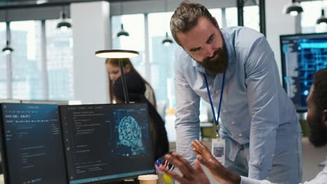 manager supervising developer with paraplegia writing deep learning code