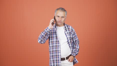 Man-getting-bad-news-on-the-phone-gets-upset.