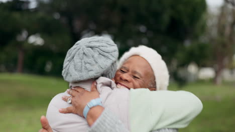 Smile,-care-and-senior-friends-hugging-in-a-park