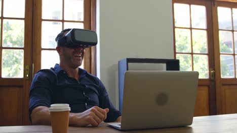 Businessman-using-virtual-reality-headset-in-office-4k