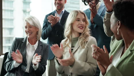 diverse business team applauding success at office