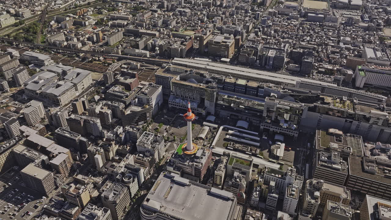 Kyoto Japan Aerial v88 high birds eye view flyover Higashishiokojicho capturing landmark tower, major railway staton and Shimogyo ward downtown cityscape - Shot with Mavic 3 Pro Cine - Oct 8th 2023
