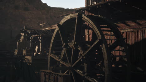 old wooden watermill in a canyon