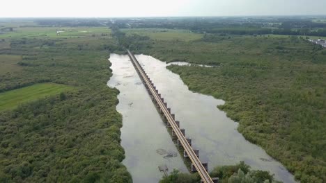 aerial drone view of the historic moerputten railroad bridge in the netherlands, europe