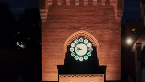 clock of town hall at night