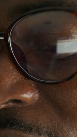close-up of a person wearing glasses