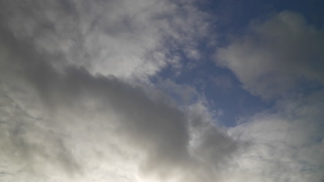 timelapse of medium paced clouds on a blue sky