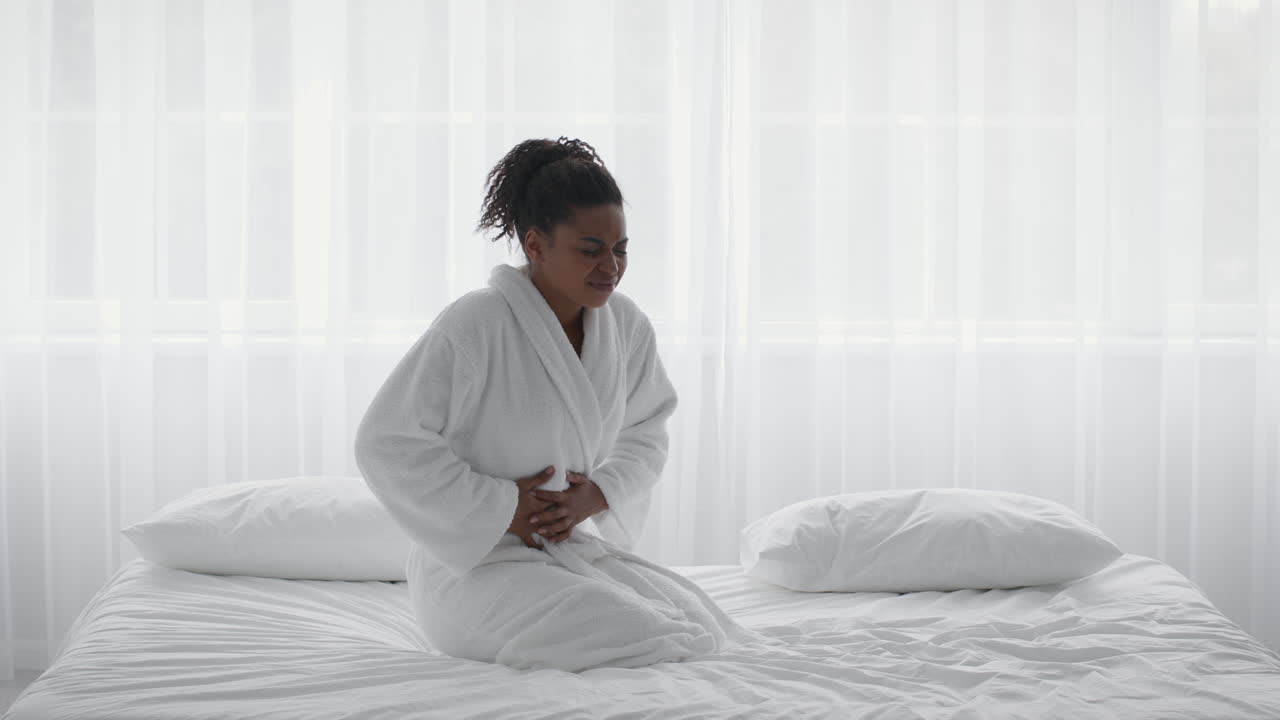 Woman Experiencing Stomach Pain