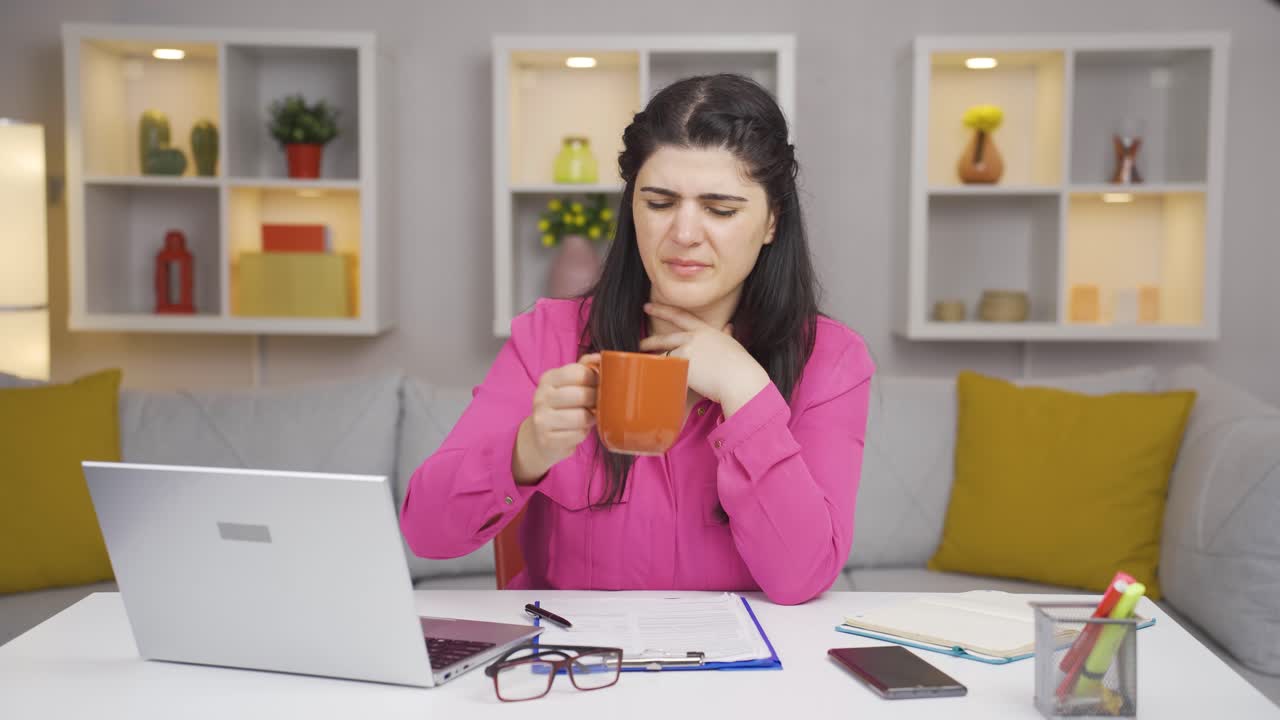 Home office worker woman suffering from sore throat.