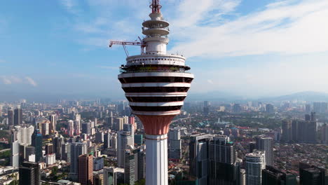 Aerial-Close-up-Of-Menara-Kuala-Lumpur-Tower-In-Kuala-Lumpur,-Malaysia