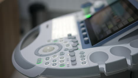 close-up of ultrasound machine control panel