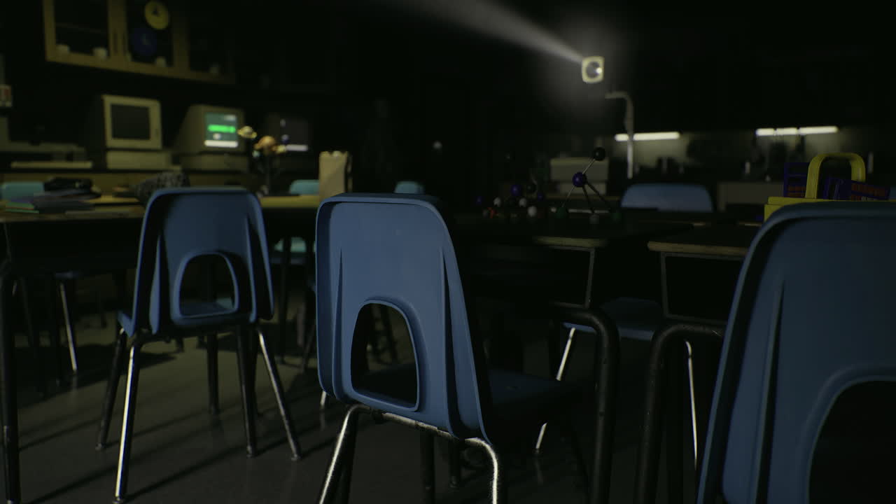 Classroom setting with blue chairs and projector illuminating space