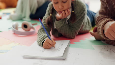 Girl-kid,-father-and-homework-on-floor