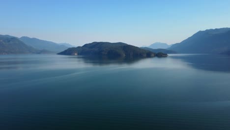 serene aerial view of harrison hot springs lake in british columbia