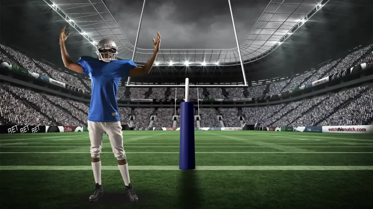 필드 골에 서 있는 미국 축구 선수