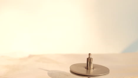 spinning toy iron a rounding string also called lattoo in india. its a kids game rounding fast.
