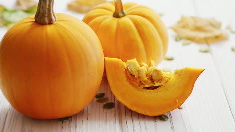 yellow pumpkins laid on table