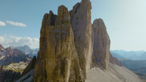 aerial drone shot of the tre cime di lavaredo in the dolomites alps in italy, 4k