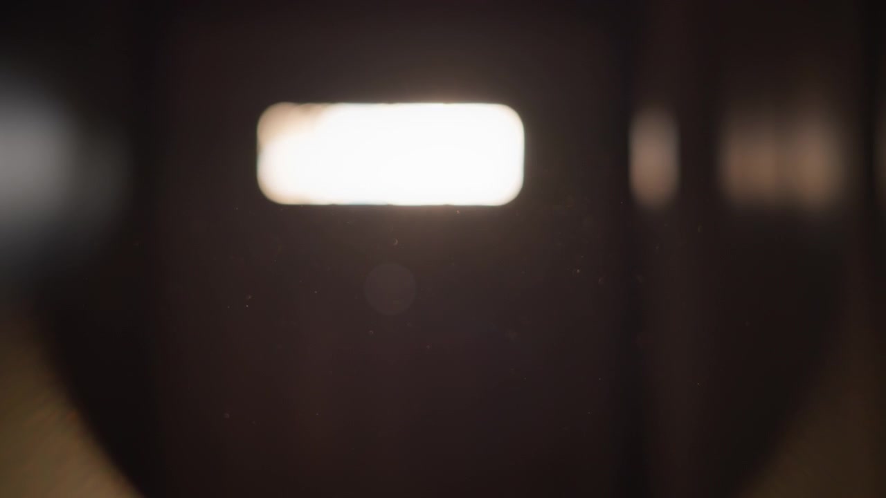 Dust particles floating in sunlight