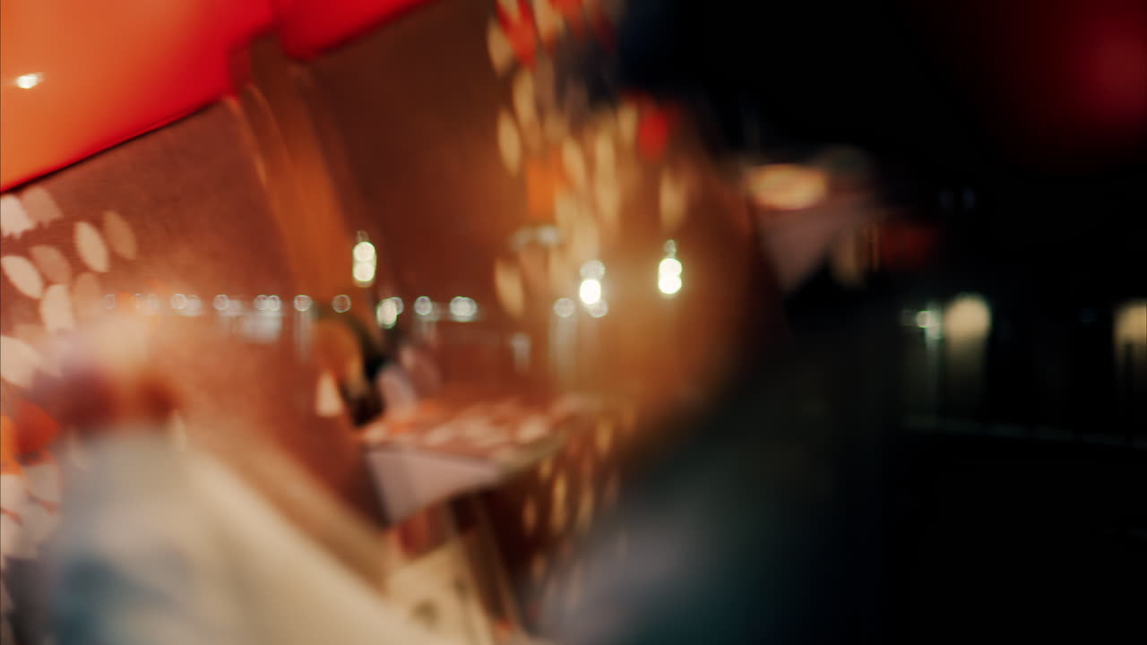 Blurred view of the city from a train window at night