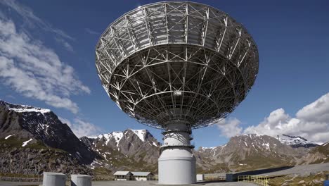 large satellite dish in mountainous terrain