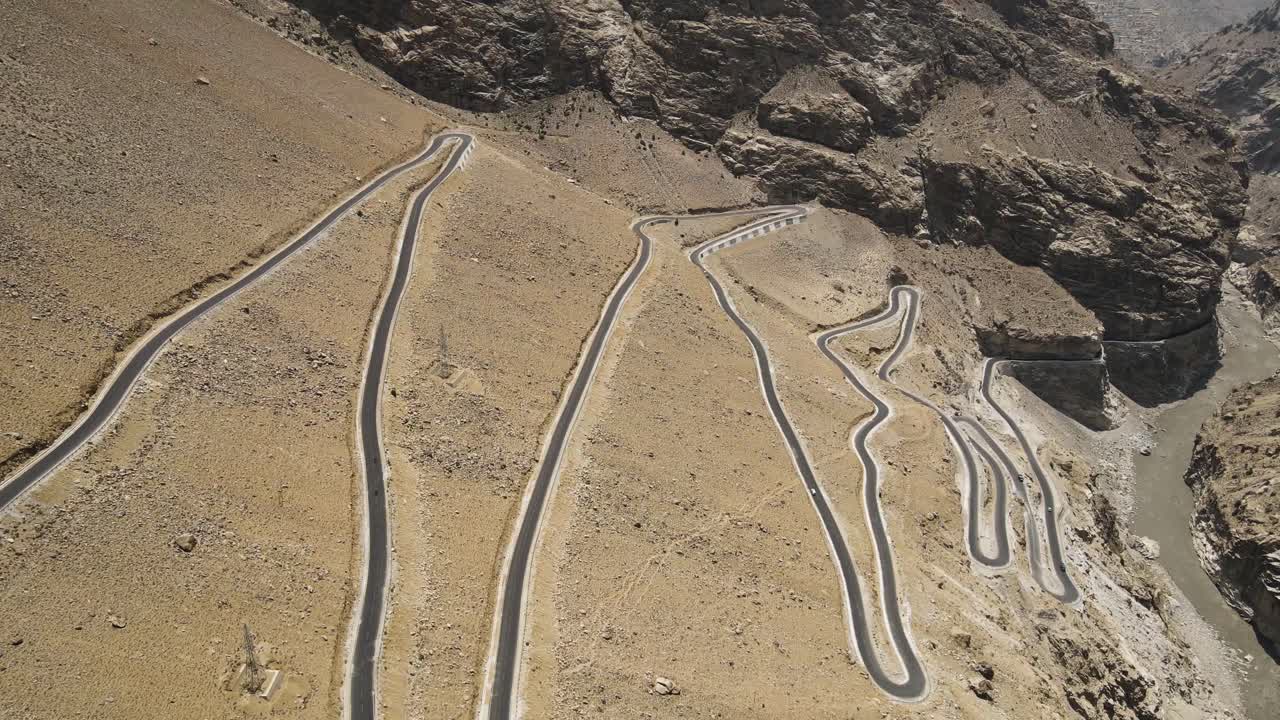 Aerial Drone shot of curvy road, ghata loops in Himachal Pradesh.