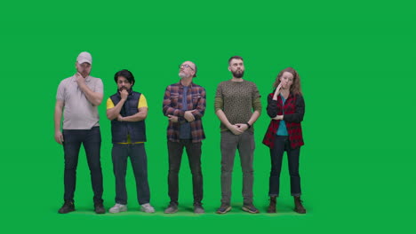 Group of People Pondering in Front of Green Screen