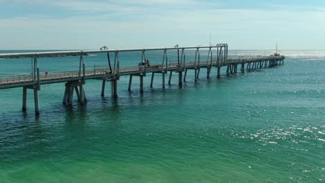 flying slowly adjacent to the gold coasts sand pumping jetty, the only permanent facility of its king in australia