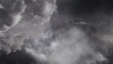 flying through dark gray cumulonimbus clouds