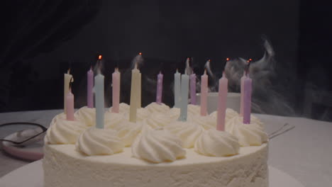 birthday cake with burning candles