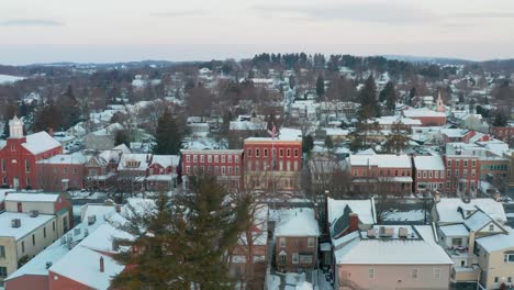 aerial of town square in usa with american flag