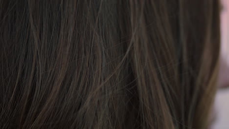 close up portrait of beautiful young woman looking confident enjoying seaside at sunset