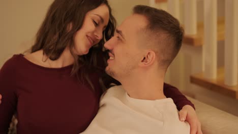 a loving couple is spending time at home.