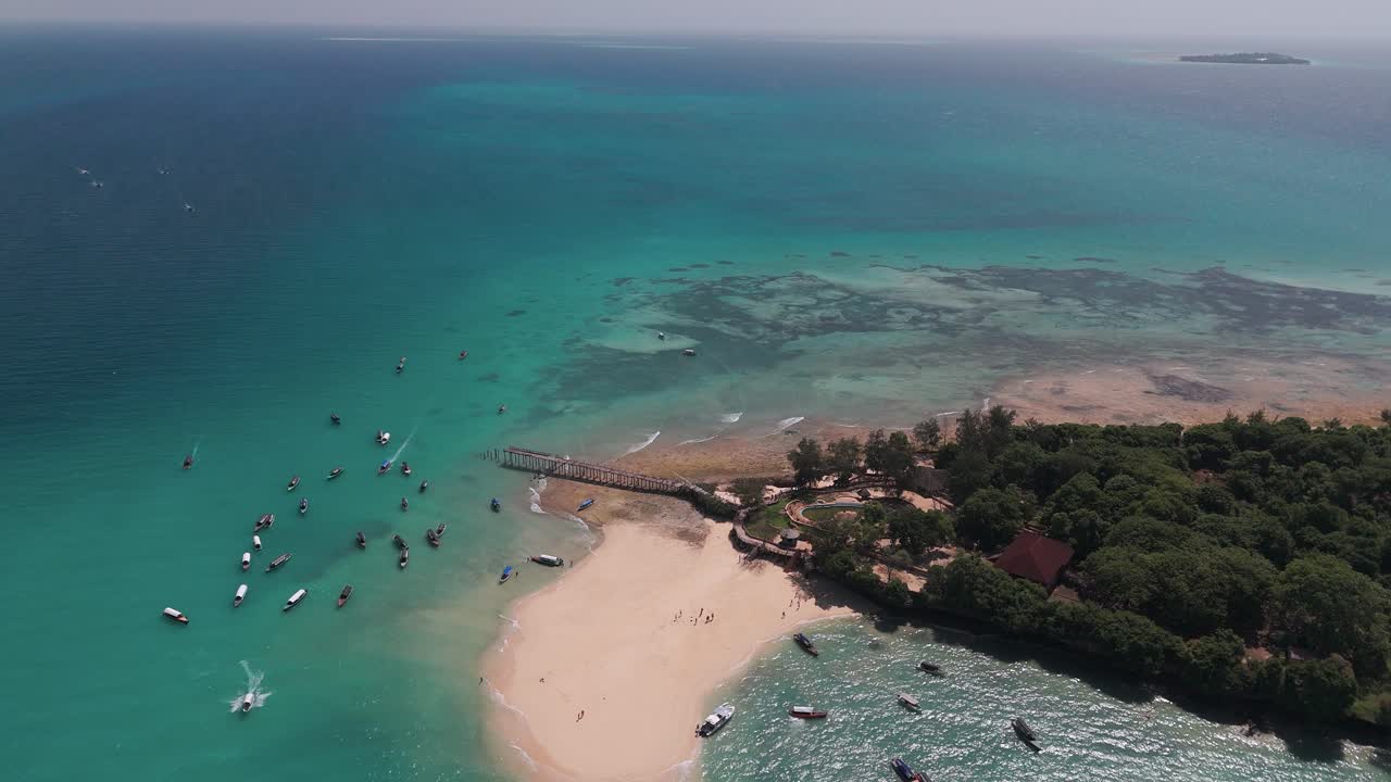 Tourist Boats At Changuu Island, Prison Island Near Stone Town In Zanzibar, Tanzania. Aerial Drone Shot