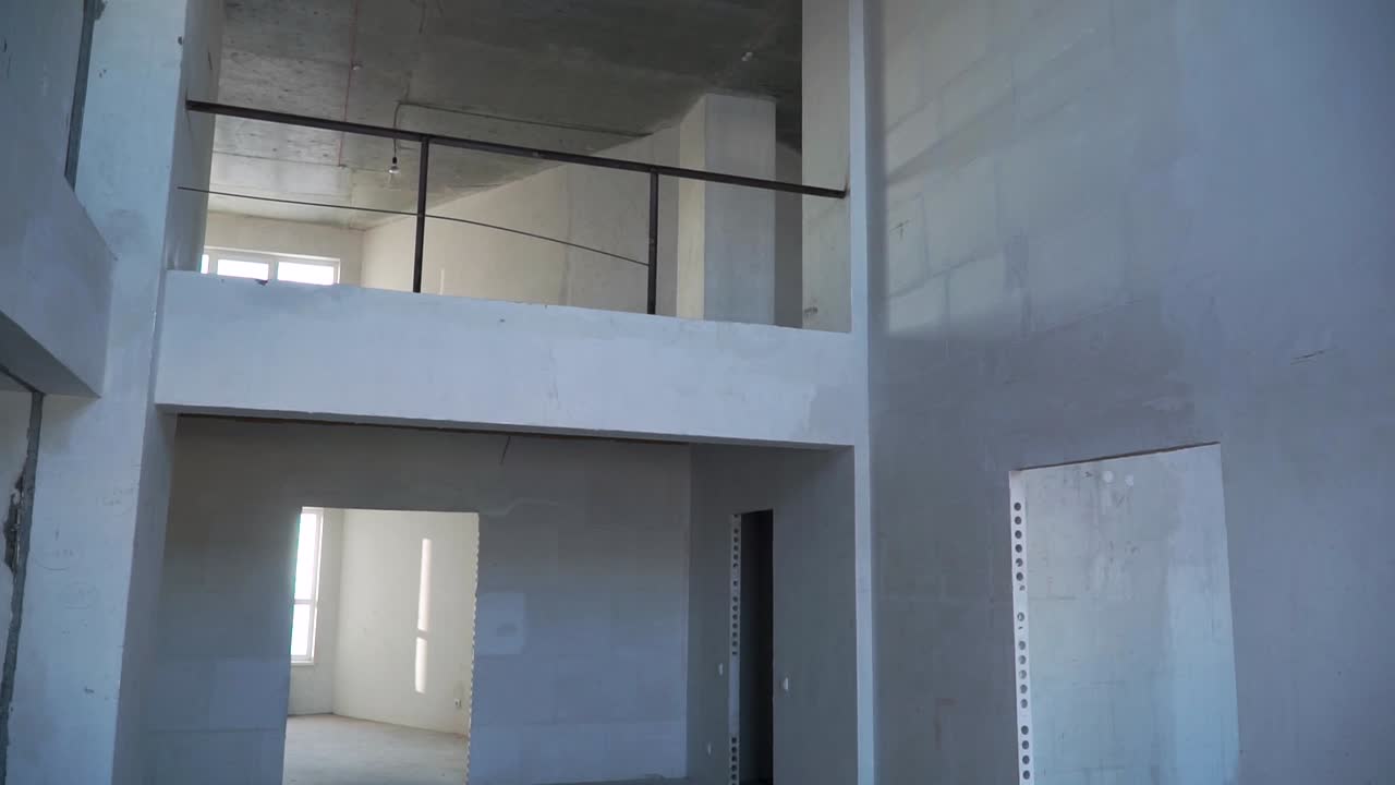 Unfinished Interior of a Modern Home Under Construction