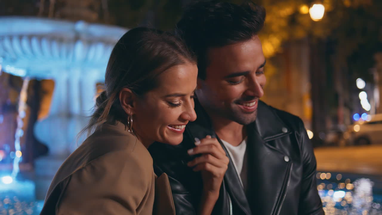 Romantic couple kissing evening street closeup. Happy partners resting city