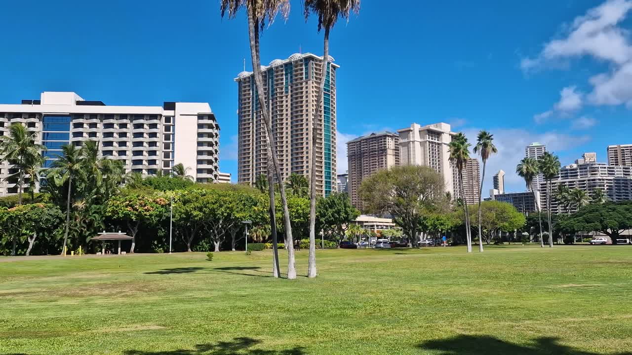 Honolulu, Hawaii USA, Hot Sunny Day Over Condominium Buildings and Park, Panorama