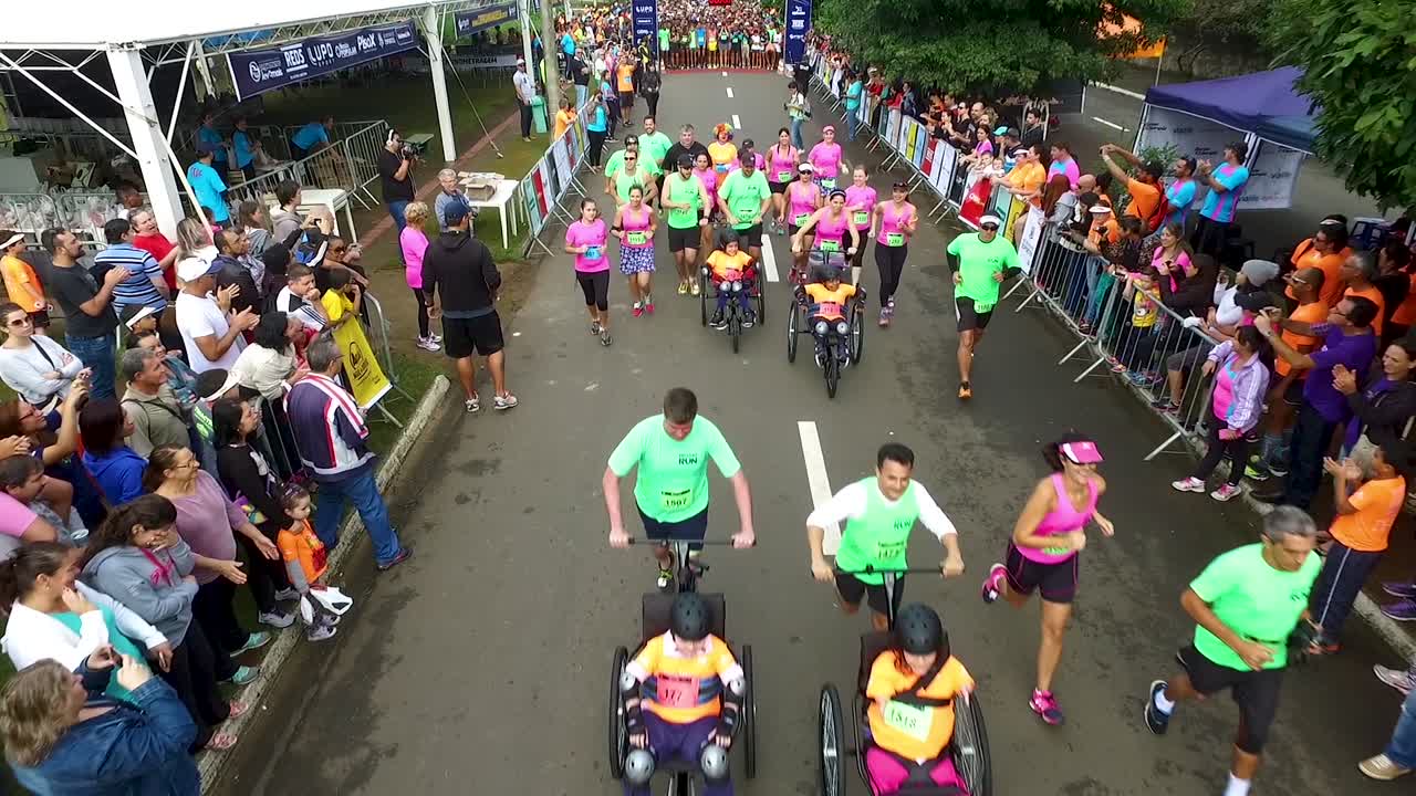 Start of an Inclusive Race Event with Runners and Wheelchair Participants