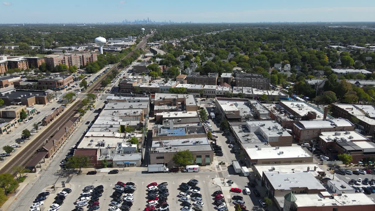 La Grange, IL on a sunny fall day, showcasing streets, buildings, and the suburban landscape With Downtown Chicago in Background. Crane Up Right Day E