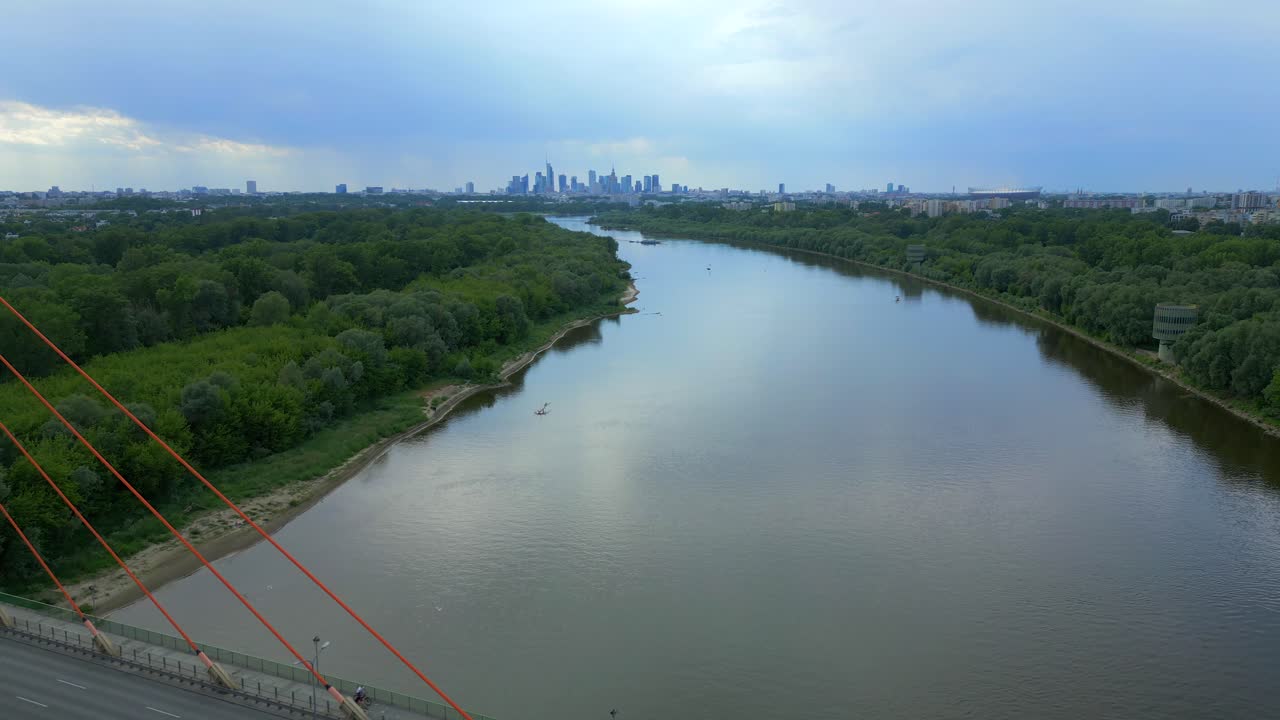 Busy traffic on Siekierkowski bridge crossing Vistula River