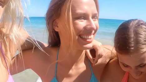 Female-friends-having-fun-on-beach