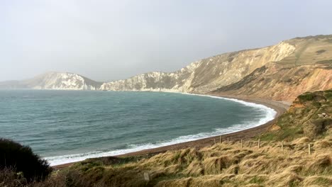 Beautiful-landscape-shot-panning-across-a-typical-English-coast-in-sun