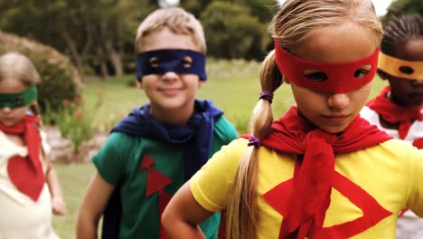 group of kids pretending to be a super hero