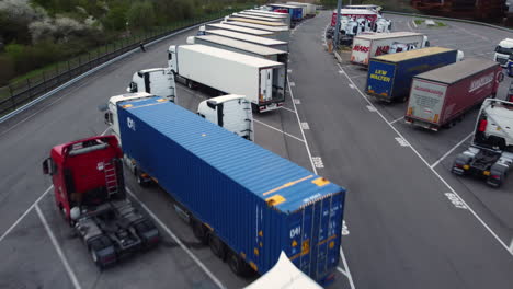 trucks and trailers at a transportation hub