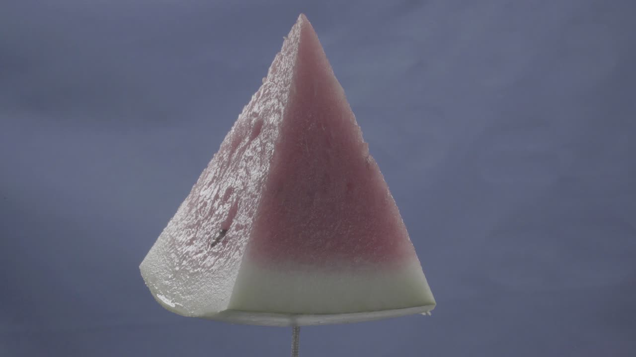 sandía girando con bucle en pantalla azul para la llave de croma